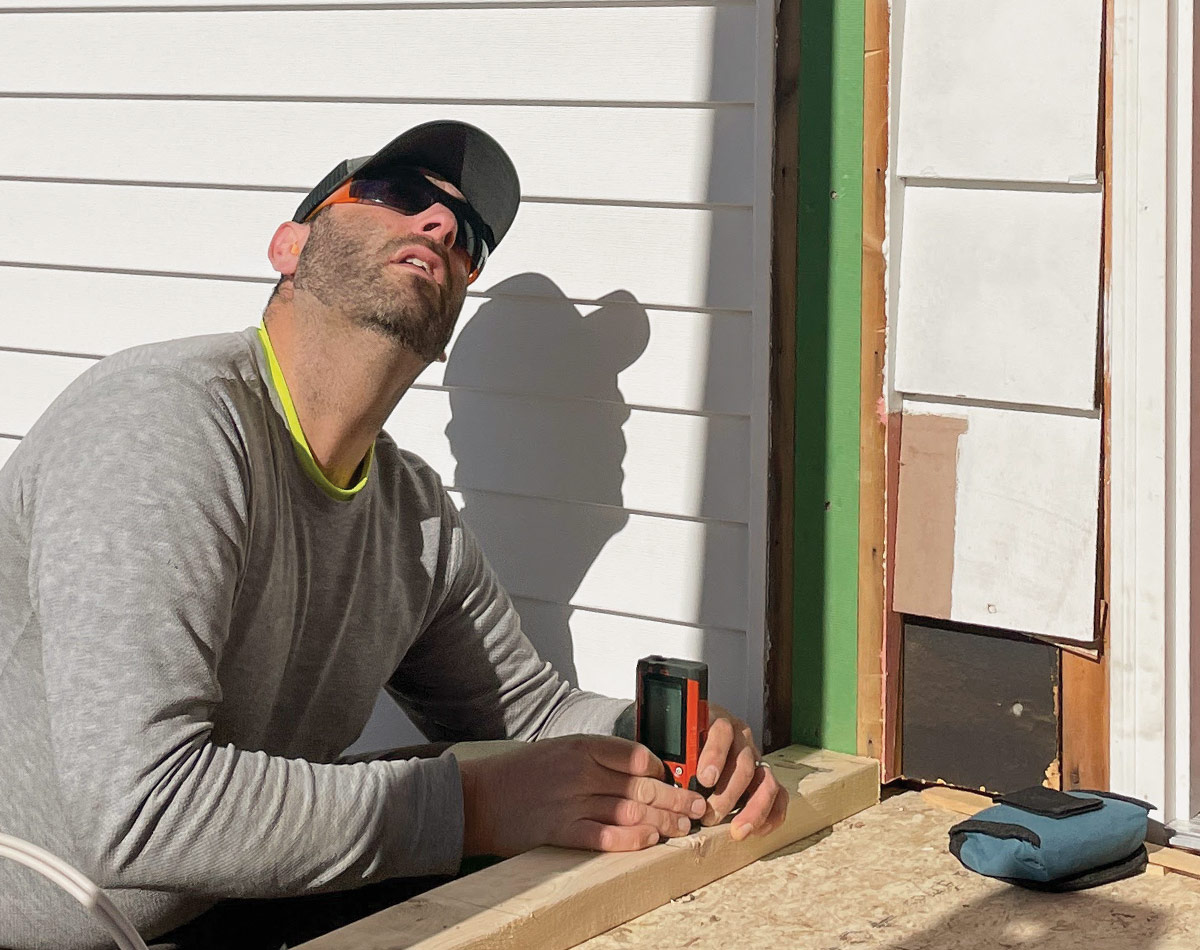 measuring studs with a laser measurer