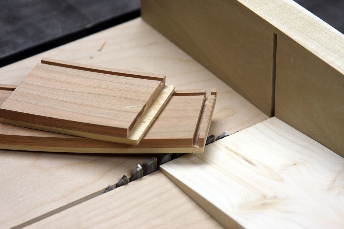 Simple fixture flattens curved drawer fronts for joinery FineWoodworking
