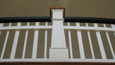 Floating handrail with custom newels - FineWoodworking