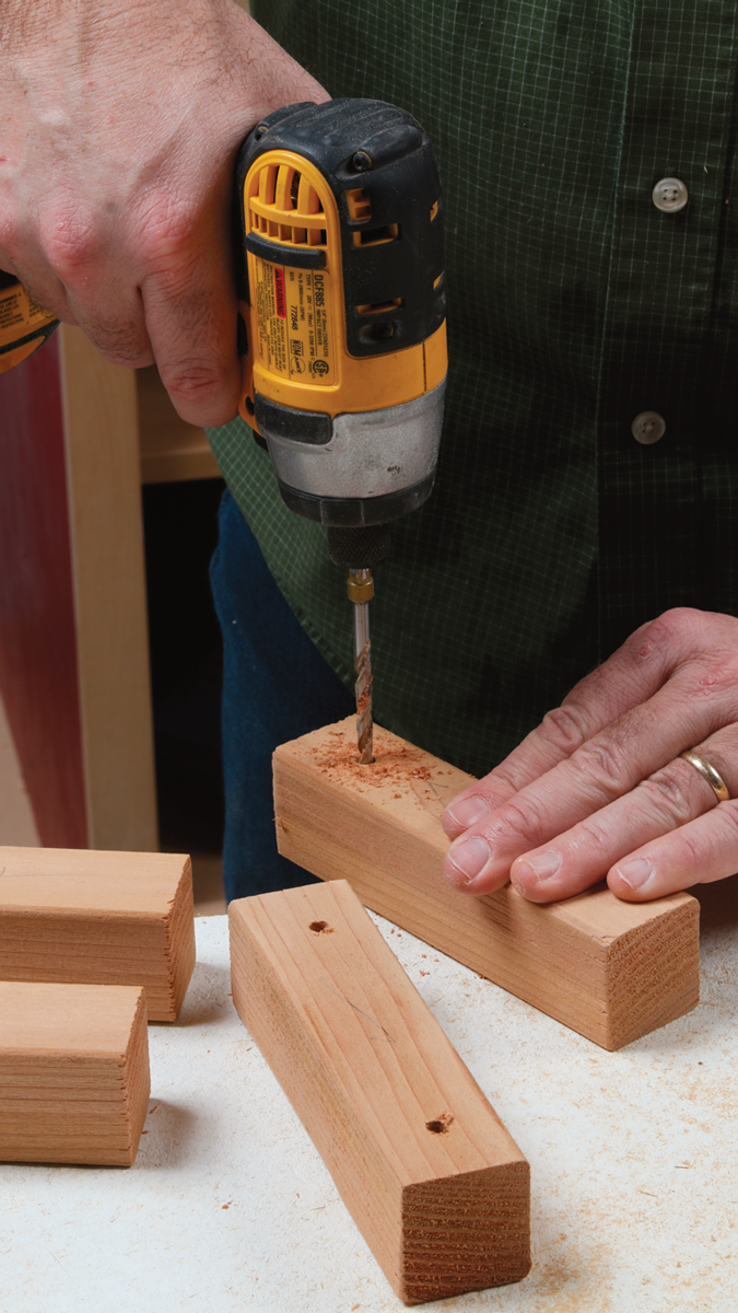 The small center pieces need clearance holes for the screws. Drill two holes in each piece.
