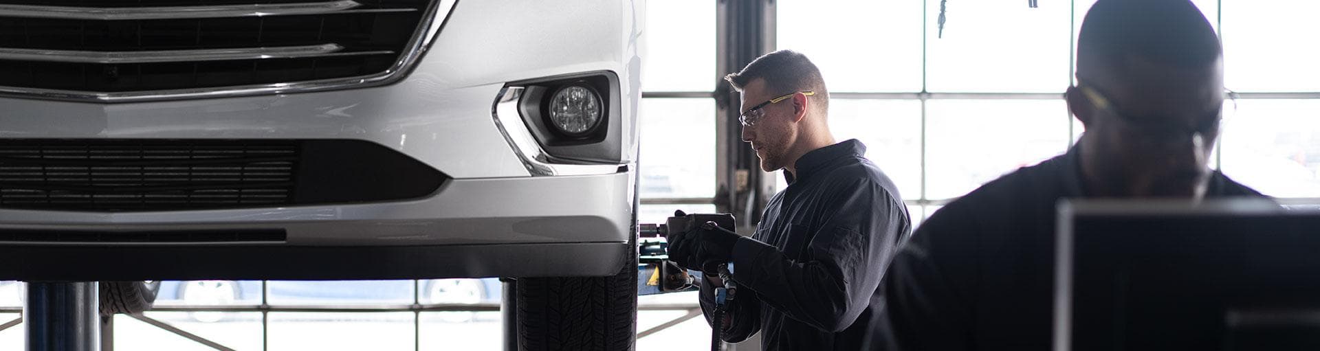 Chevrolet Technician Working on Tires