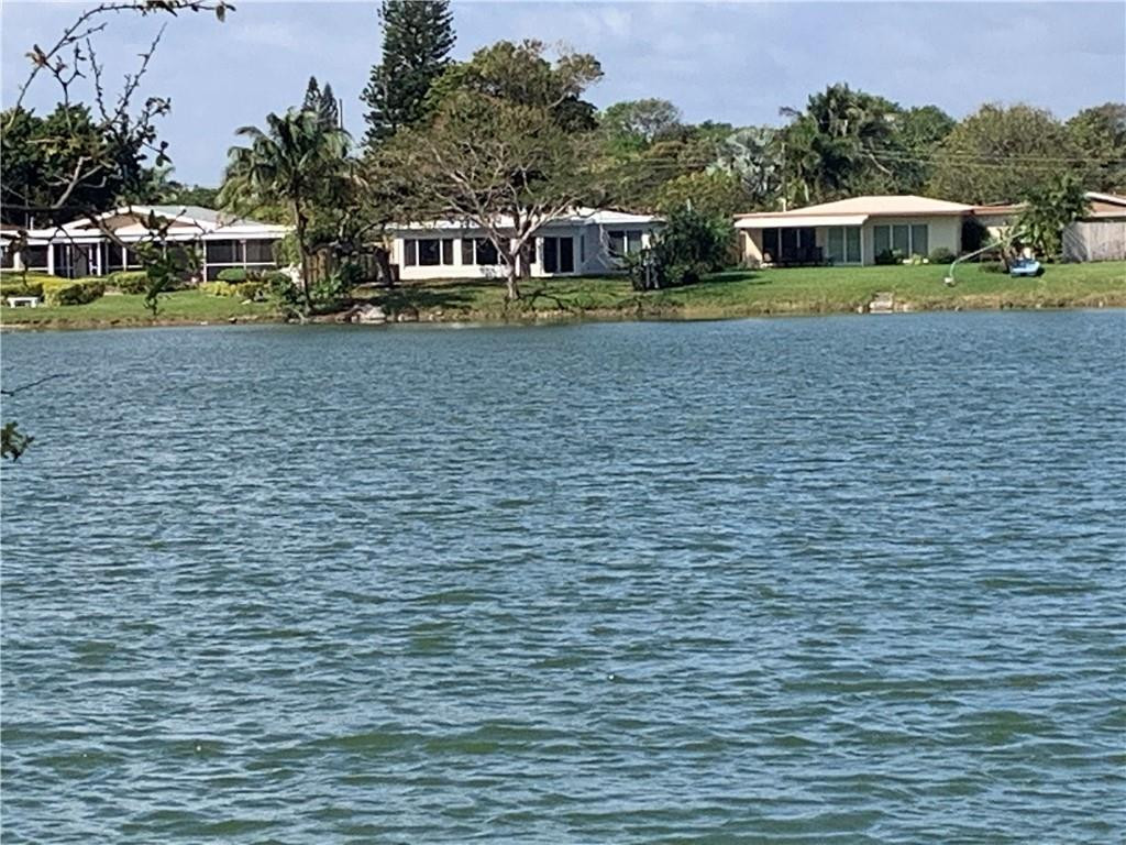 Back of the house view from across the lake