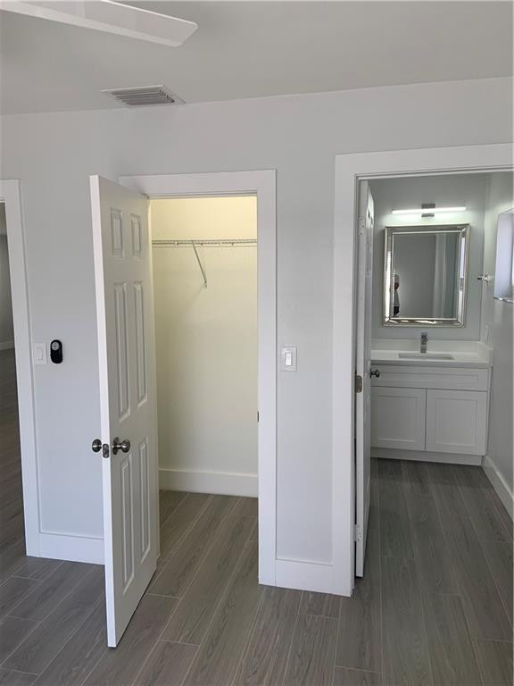 Closet and en-suite bathroom in master bedroom