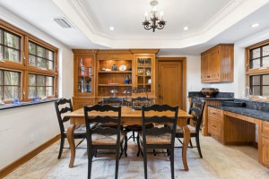 Breakfast area that forms part of the Main Kitchen (laundry room and staff bedroom ensuite is behind the door in picture)