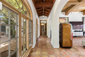 Passage way leading to the guest section of the house that has 4 bedrooms all ensuite, two living rooms, and a small kitchen