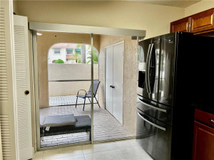 Sliding door leading to screened in patio Sliding door leading to screened in patio