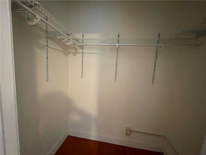 One of two WALK-IN CLOSETS in SECOND BEDROOM One of two WALK-IN CLOSETS in SECOND BEDROOM