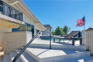 Stairs from the lower/dock level to the pool level.