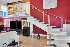 Stairs from Main Level 2 to the pair of Level 3 bedrooms, each with a private bath. Stairs from Main Level 2 to the pair of Level 3 bedrooms, each with a private bath.