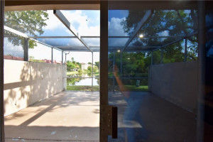 Photo for 3185 Coral Springs Drive, 127, Coral Springs, FL 33065 - Listing #FX-10310779 Large screened patio with light filters on window