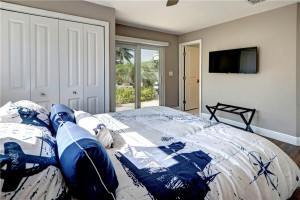 Photo for 135 SE 19th Avenue, Deerfield Beach, FL 33441 - Listing #FX-10277939 BEDROOM #1 - ATTACHED TO A BATHROOM & SLIDING DOOR TO THE POOL AREA