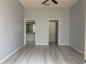 Owner's suite w/ walk in shower and closet storage Owner's suite w/ walk in shower and closet storage