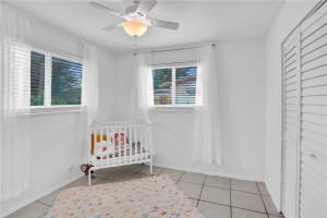 Guest Bedroom number 1 with new paint and impact windows.