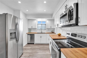 New waterproof vinyl flooring. The kitchen is bright and cheerful.