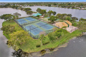 Overhead shot of the City of Oakland Park's Tennis, Racket Ball and Pavilion area with walking trails.