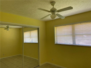 Photo for 10760 NW 43rd Court, Coral Springs, FL 33065 - Listing #FX-10313517 Bedroom 3 with Walk-in Closet With Mirror Front