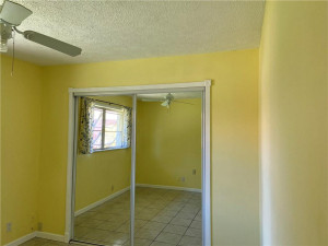 Photo for 10760 NW 43rd Court, Coral Springs, FL 33065 - Listing #FX-10313517 Bedroom 3 with Walk-in Closet With Mirror Front