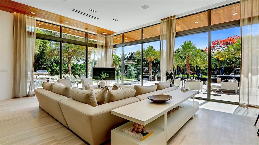 Casual living area looking out over patio oasis.