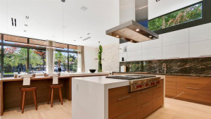 Generous kitchen island with Wolf gas stove.