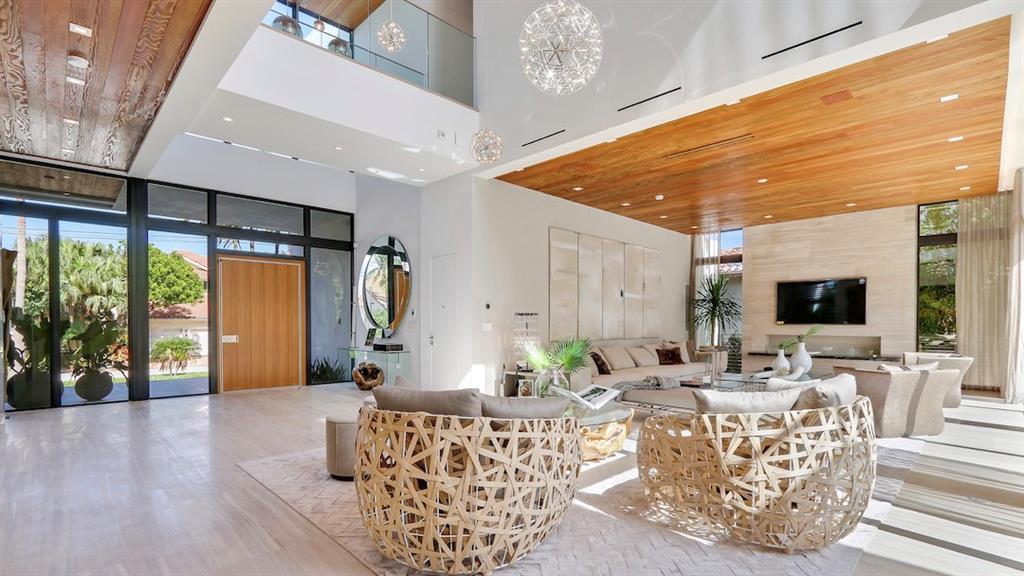 Formal living area with built in fireplace.