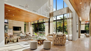 Foyer with vaulted ceilings and stunning outdoor views to patio and water.