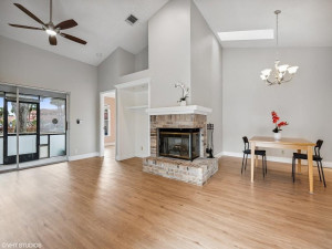 Wide open floor plan allows for natural light to pour in! real working wood fireplace!