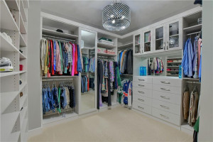 Main closet with updated organization from entry