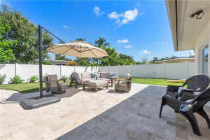 New travertine pavers round out this patio perfection! New travertine pavers round out this patio perfection!