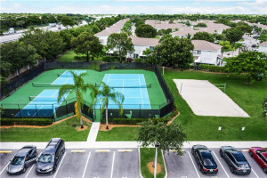 Clubhouse With Resort Style Amenities Including Tennis Courts and Volleyball Clubhouse With Resort Style Amenities Including Tennis Courts and Volleyball