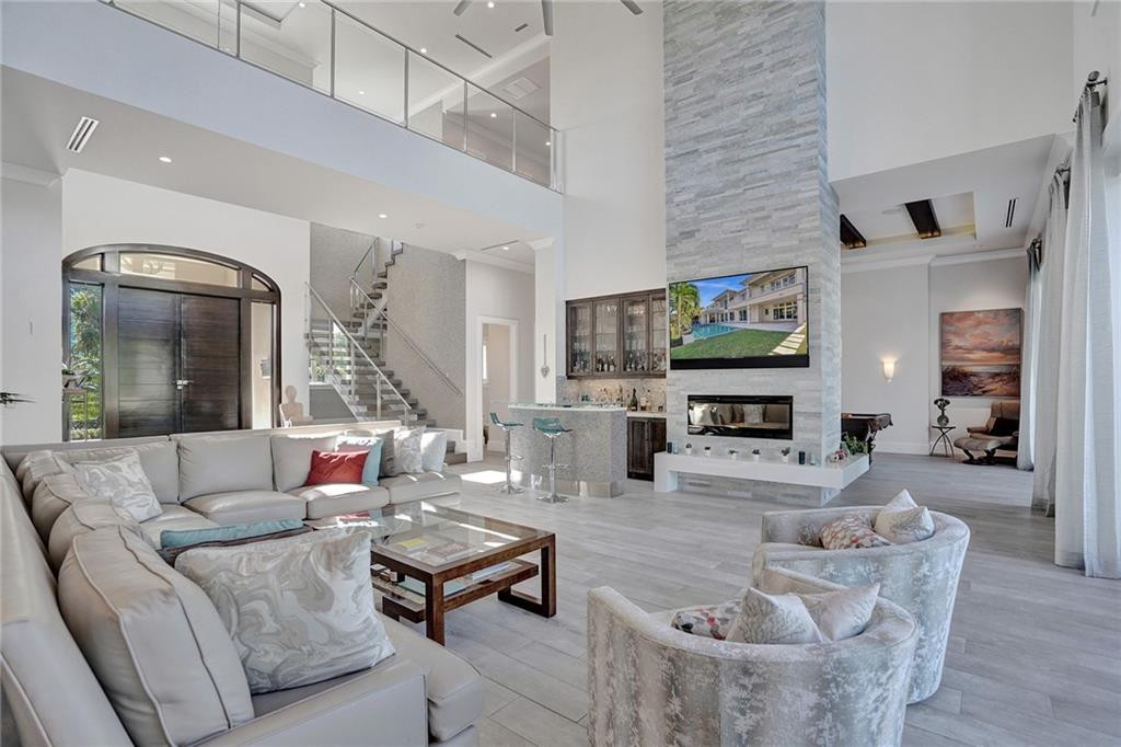 Imported Italian Tile Floors, Floor to Ceiling Impact Glass Sliding Doors which pocket into each other