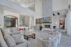 Imported Italian Tile Floors, Floor to Ceiling Impact Glass Sliding Doors which pocket into each other