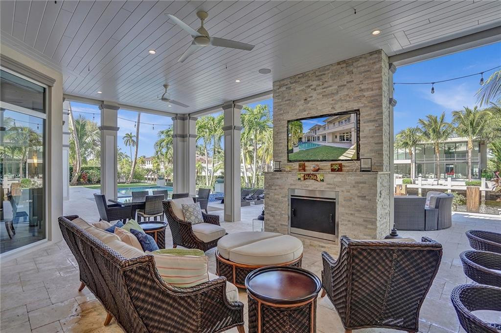 Summer Kitchen w/Built In Wolf Gas Grill & 2 Side Burners, Refrigerator,, Icemaker, Sink, Storage Cabinets