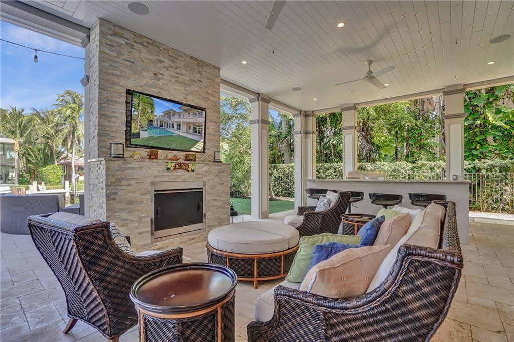Summer Kitchen with Fireplace, Ceiling Fans, Rolladen Shutters Around Entire Area