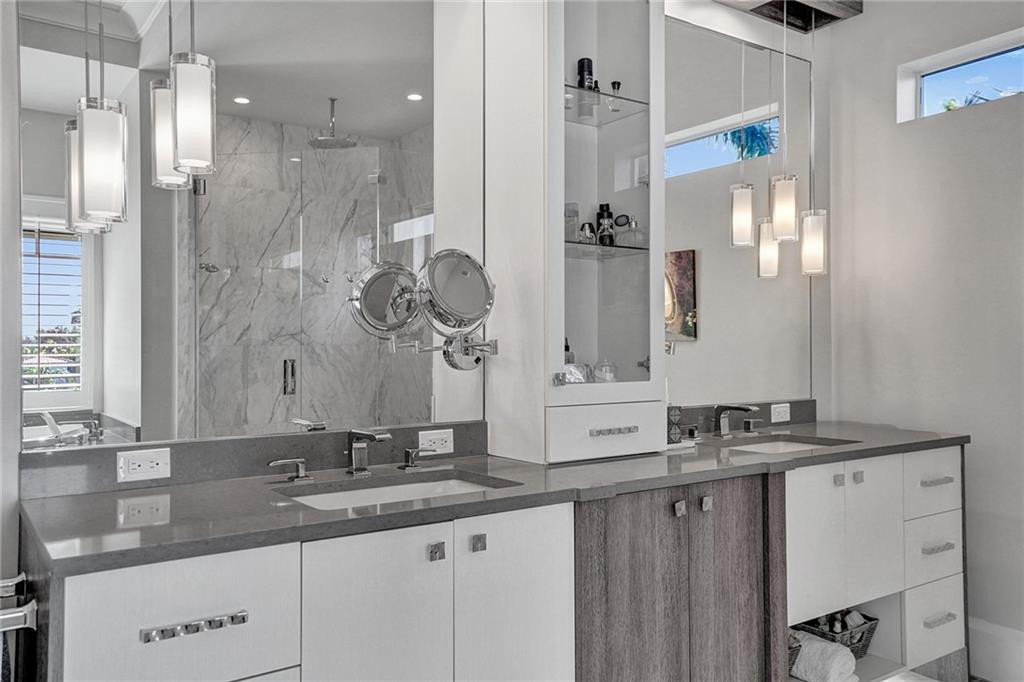 Beautiful double sink vanity and jacuzzi tub
