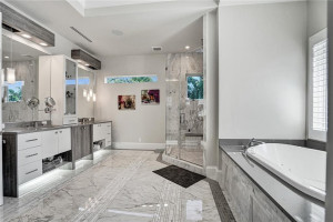 Beautiful double sink vanity and jacuzzi tub