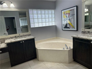 Primary bathroom with soaking tub and shower