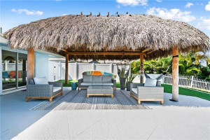 Enjoy indoor outdoor living under your Tiki hut