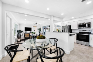 Dining area with view into living room & kitchen