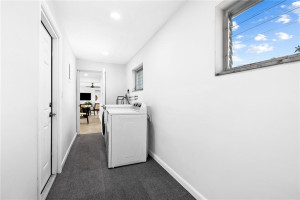 Separate utility room. Carport door on left.