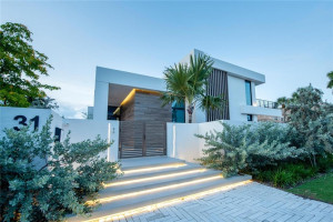 DUSK GATED HOUSE ENTRANCE WITH ACCENT LIGHTING