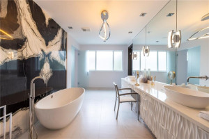 Stunning master with dual sinks, dual toilets, and dual showers with steam bath