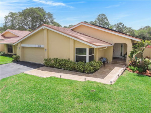 Welcome HOME to tropical, LAKEFRONT POOL home in paradise!