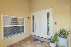 ALL IMPACT WINDOWS AND DOORS! Entry door with double sidelights.