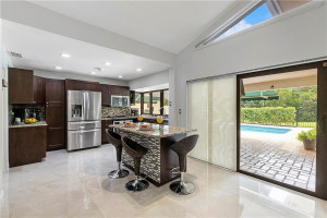 Entertaining is a breeze in your gourmet, chef's kitchen with S/S Whirlpool appliances.