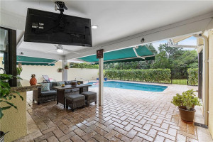 Covered, southern facing patio with 2 sunshades.