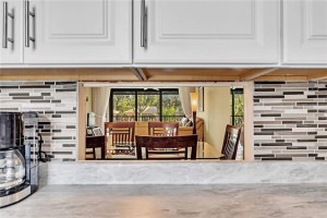 looking through to living space from pass through in kitchen