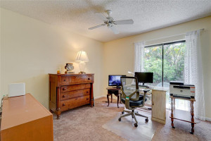 4th Bedroom currently being used as office with view of backyard thru another set of Sliding Doors 4th Bedroom currently being used as office with view of backyard thru another set of Sliding Doors
