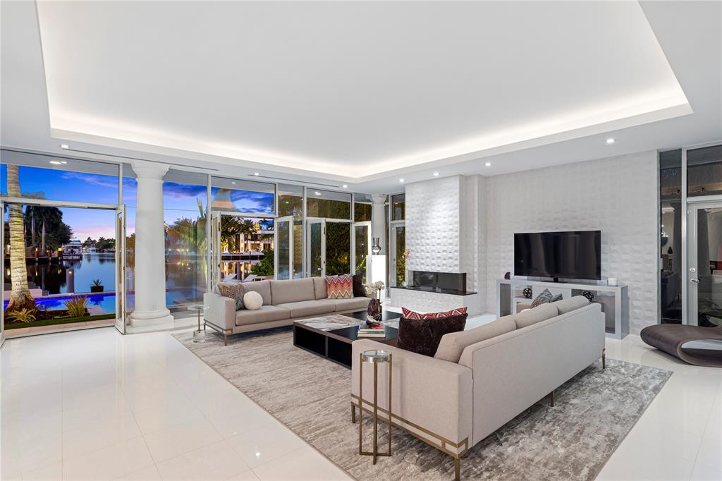 Comfortable living open room with great views to waterway.