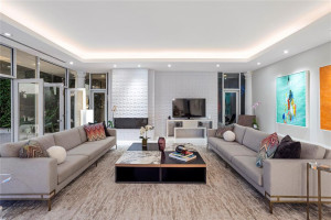 Comfortable living open room with great views to waterway.