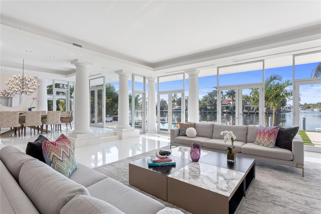 Comfortable living open room with great views to waterway.